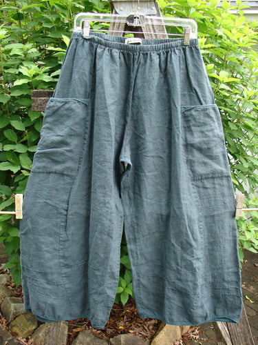Barclay Linen Flutter Top Cargo Pant Unpainted Tealsa Size 1, featuring a full elastic waistline, billowing fall, curved sectional panels, dimensional widening lowers, and two inseam side pockets, ideal for versatile styling.