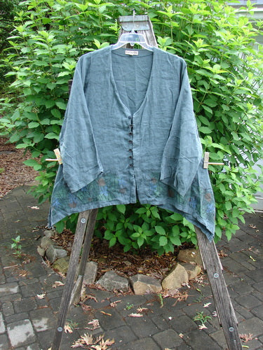 Barclay Linen Tiny Button Dip Side Cardigan Daisy Field Green Mineral Size 0 features a deep V-neck, vented hem, three-quarter sleeves, and textured buttons, epitomizing Bluefishfinder.com's vintage, creative style.