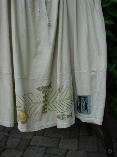 1999 NWT Tadpole Jumper Single Gold Fish Sky Natural OSFA, featuring adjustable shoulder straps, sweeping hemline, drawcord criss-cross back, and round-bottomed pockets, made from organic cotton.