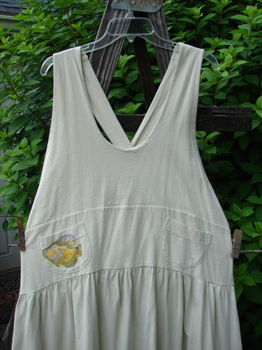 1999 NWT Tadpole Jumper Single Gold Fish Dawn Natural OSFA featuring adjustable shoulder straps, a sweeping hemline, criss-cross back, and a gold fish design on organic cotton.