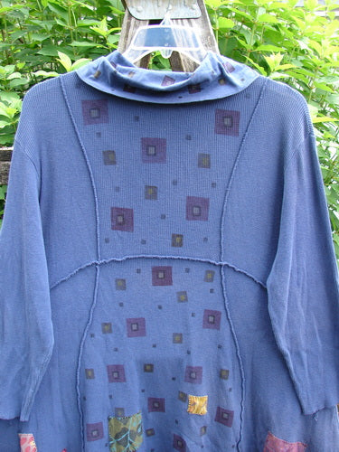 Barclay Patched Thermal Reverse Stitch Pocket Dress in Royal Blue showcases a unique cowl neck, exterior stitching, and painted patches, emphasizing creative vintage style with a flattering A-line shape and generous pockets.