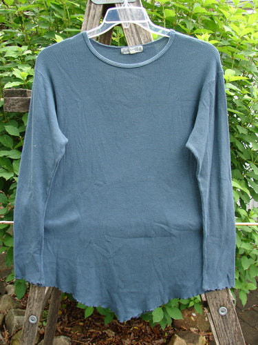 Barclay Thermal Stretch Long Sleeved Curl Edge Top Unpainted Teal Size 1, featuring a unique rolled neckline, curly-edged long sleeves, and a varying hemline, perfect for layering.