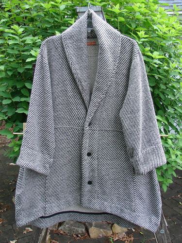 Barclay Patched Wool City Side Big Pocket Coat in Black White Stripe, featuring a stand-up collar, sectional panels, deep dual pockets, and an A-line flair, from Bluefishfinder.com's Winter Collection.