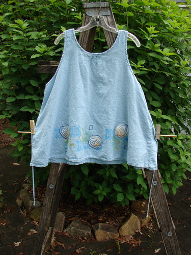 2000 Hemp Flared Tank Tumble Blue Jet Size 2 featuring a scooped neckline, A-line flare, and bright hemline paint. Designed with a tie string for adjustments, embodying Bluefishfinder.com's vintage appeal.
