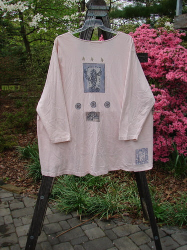 1996 Triangle Cardigan Travel Blue Fish Birch Bark OSFA displayed on a hanger, featuring a deep V-neckline, angled front pockets, and original buttons.