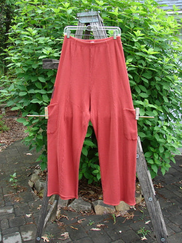 Barclay Thermal Patched Pottery Pant Leaf Sienna Size 1, featuring a cozy elastic waist, vertical stitchery, painted leaf patches, deeper drop pockets, and tapered lowers with flat tape accents.