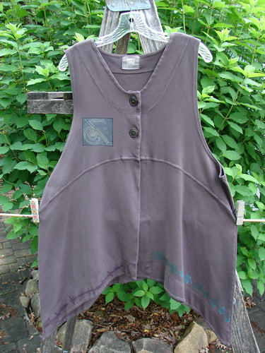 2000 Interlock Edinburg Vest Celtic Peat Size 1, featuring a pointed side hem, scooped empire waist, double-paneled hemline, and colorful Celtic paint, embodies vintage Blue Fish Clothing's creative expression.