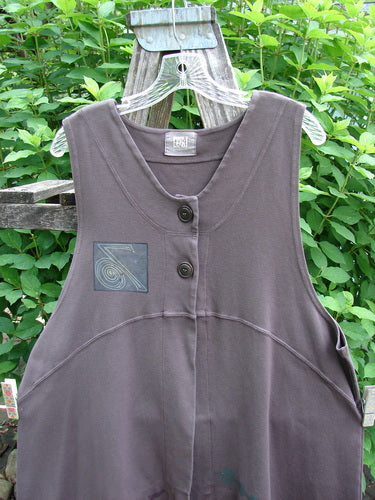 2000 Interlock Edinburg Vest Celtic Peat Size 1, featuring dramatic pointed side hem, upward scooped hemlines, deeper armholes, exterior stitchery, and colorful Celtic theme paint, highlighting vintage Blue Fish style.