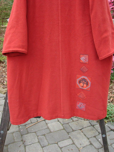 1999 Patched Woven Overcoat Tomato Altered Size 0 featuring hand-blocked patches, oversized buttons, deep inseam pockets, and foldable sleeves, showcasing vintage-inspired design and craftsmanship.
