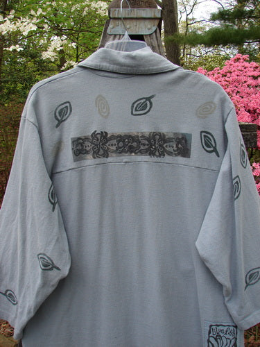 1994 Reprocessed Work Shirt Topiary Moon Solstice Blue OSFA featuring a unique leaf design on the front pocket, tapering pointed collar, deep drop shoulders, and Blue Fish signature buttons.