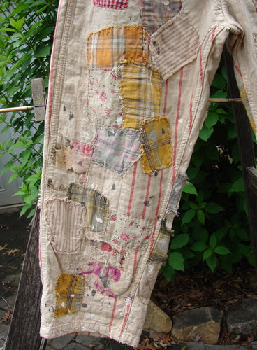 Magnolia Pearl NWT European Cotton Patchwork Miner Jean Encore OSFA features heavy-weight cotton, adjustable button fly and waist, contrasting patches, distressed textures, and unique stitchery, embodying BlueFishFinder.com's vintage and creative style.