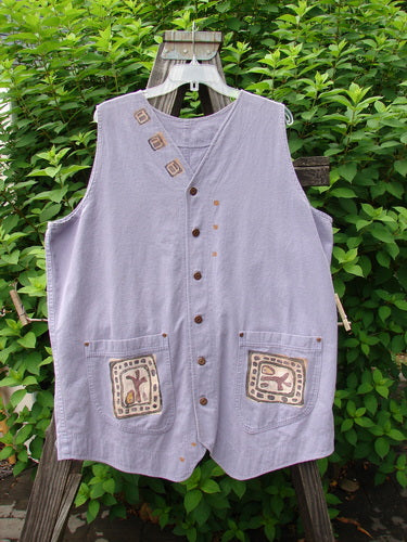 1996 Denim Visionary Vest Travel Stone Stratus Size 1: Patchwork design, V-shaped neckline, metal buttons, rivet-topped pockets, rear buckle draw tab, shirt tail front hem, upward scooped back line.