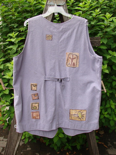 1996 Denim Visionary Vest Travel Stone Stratus Size 1 featuring a V-shaped neckline, metal front buttons, rivet-topped pockets, rear buckle draw tab, shirt tail front hem, and upward scooped back line.