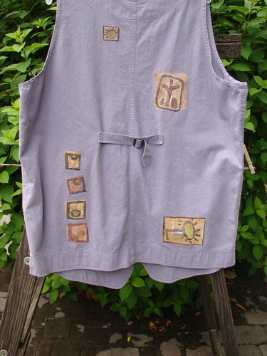 1996 Denim Visionary Vest Travel Stone Stratus Size 1, featuring a V-shaped neckline, metal front buttons, tiny rivet-topped pockets, rear buckle draw tab, and artistic design elements.