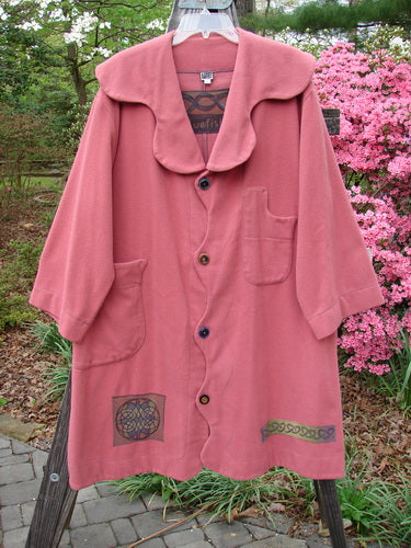 2000 Patched Wool Nora Coat Pastel Geranium Size 0 displayed on a pole. Features scalloped button line, unique patches, two front pockets, and oversized vintage buttons.
