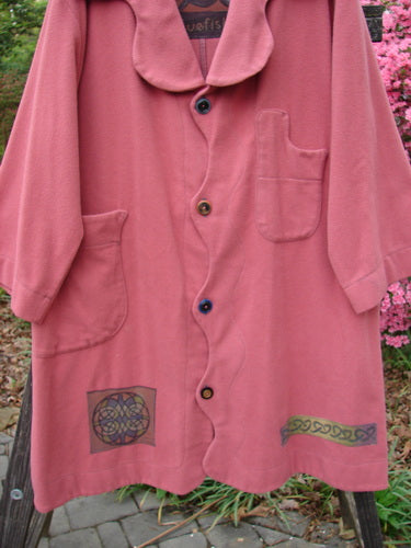 2000 Patched Wool Nora Coat Pastel Geranium Size 0, featuring scalloped button line and collar, two front pockets, brightly painted patches, and oversized vintage buttons.