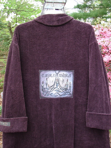 1999 Patched Chenille Angle Pocket Jacket in Deep Burgundy, featuring oversized vintage buttons, diagonal floppy pockets, and a large holiday-themed patch.