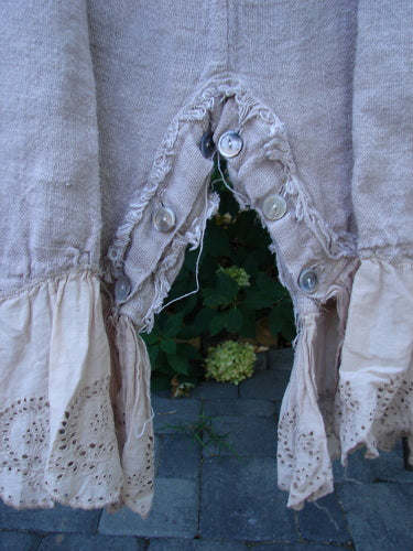 Magnolia Pearl Heavy Gauze Embroidered Signature Farm Love Overall Natural OSFA, featuring buttoned triangular opening, frayed seams, and decorative eyelet-embroidered ruffle hem, embodying vintage charm and craftsmanship.