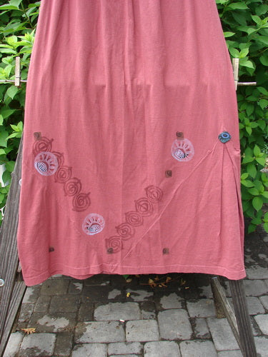 1996 Dubuffet Skirt Tumble Stone Ember Size 2 from Fall Collection, featuring an A-line shape, abstract design, elastic waist, triangular pleated side panels, and painted buttons (without flutters).