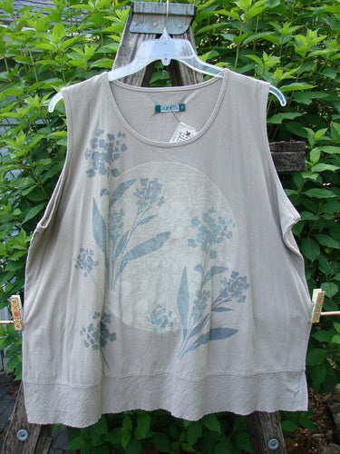 Barclay NWT Flutter Bottom Tank Moon Rock Size 2 features a rounded neckline and floral moon theme, made from lightweight organic cotton. The tank showcases an A-line shape with a flutter bottom design.