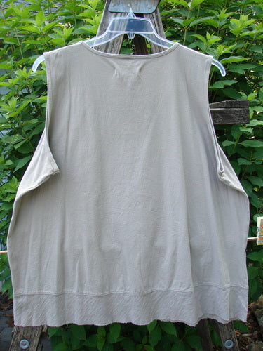 Barclay NWT Flutter Bottom Tank Moon Rock Size 2: Organic cotton tank with a rounded neckline, slight A-line shape, sweet flutter hem, and floral moon-themed design, displayed on a clothes rack.