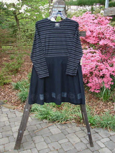 1999 NWT Fitted Circle Dress Wind Turn Black White Stripe Size 2 displayed on a hanger, showcasing its long sleeves, rounded neckline, empire waist seams, and flared lower skirt.