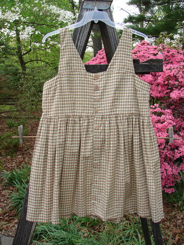 1996 Woven Roadside Jumper Unpainted White Pine Gingham Size 2, displayed hanging, features wooden buttons, squared neckline, gathered pleats, and empire waist, reflecting Bluefishfinder's vintage, creative, and expressive style.