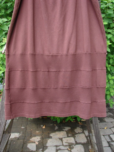 Barclay Interlock Rib Panel Skirt Unpainted Sepia Size 2 displayed on a rack, showcasing horizontal ribbed panels and smooth cotton knitting with an elastic waistline for a generous, structured fit.