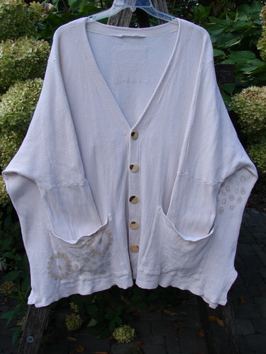 1997 Thermal Voyage Roadside Jacket Windy Floral Shell OSFA with deep V-neck, five buttons, and unique painted oversized pockets. Features dropped shoulders, roomy sleeves, and vented sides, embodying Bluefishfinder.com's vintage aesthetic.