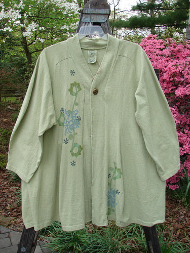 1996 Reprocessed Spring Rain Jacket Coral Reef Seedling OSFA features floral patterns, vintage closure, A-line shape, deep side pockets, and pointed lower accents.