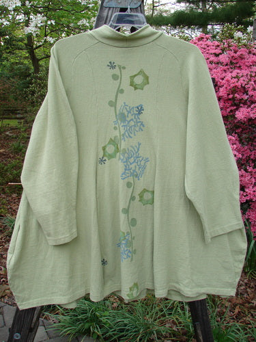 1996 Reprocessed Spring Rain Jacket Coral Reef Seedling OSFA featuring blue floral designs, long sleeves, deep side pockets, and vintage closure.