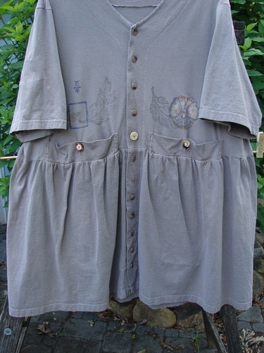 1999 Vintage Button Dress Butterfly Circle Shale Size 2 features intricate butterfly-themed paint, baby doll style, with tiny buttons, layered vintage buttons on waistline, higher pockets, and rear draw cords for fit.