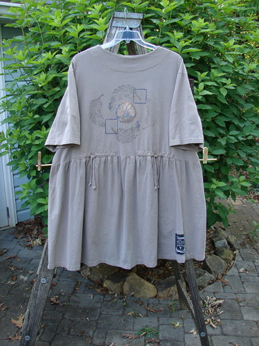 1999 Vintage Button Dress Butterfly Circle Shale Size 2 features intricate butterfly-themed paint, 11 front buttons, 3 waistline buttons, high-placed pockets, deep pleats, and dual rear draw cords for a custom fit.