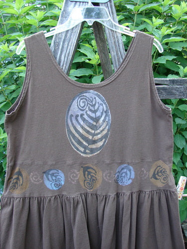 1993 Tier Dress Turn Shell Bark Size 1 featuring a unique oval neckline, banded drop waist, and flouncy lower with baby doll pleats, reflecting BlueFishFinder's vintage charm and creative individuality.