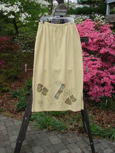 1999 NWT Side Vent Skirt Fancy Gathering Plantain Size 2, displayed on a rack, showcasing its full elastic waistline, side vents, deep side pockets, and signature lower Poetry Patch.