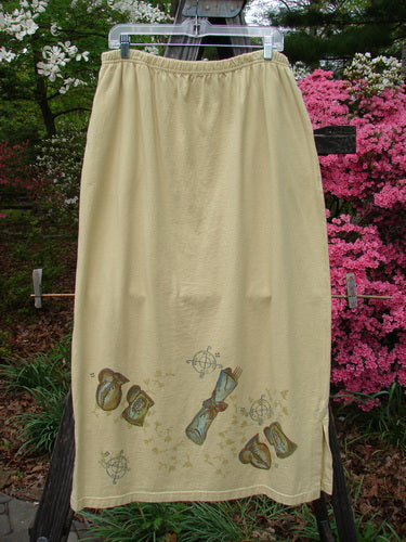 1999 NWT Side Vent Skirt Fancy Gathering Plantain Size 2, featuring a full elastic waistline, two side vents, deep side pockets, and a unique pattern design, displayed outdoors.