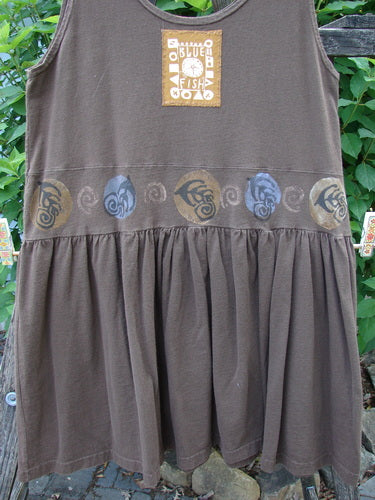 1993 Tier Dress Turn Shell Bark Size 1 features a unique oval neckline, banded drop waistline, and flouncy bottom, embodying vintage Blue Fish creativity with distinctive baby doll pleats and shell-themed paint.