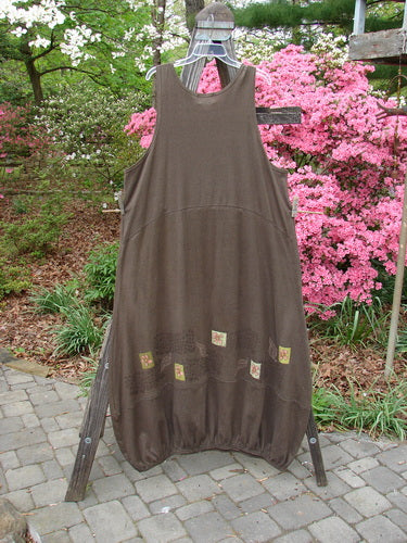2000 Cotton Hemp Libby Jumper Leaf Flower Bark Size 2 displayed on a wooden rack, showcasing a sophisticated mid-weight fabric with a downward scooped waistline, two side pockets, and a bubbled shape.