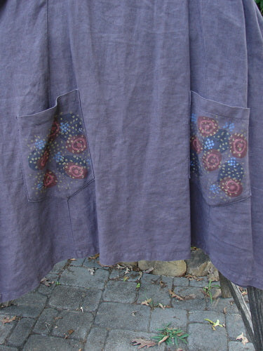 Barclay Linen Pocket Pinafore Polka Dot Plum Oversized Size 0, showcasing sectional panels and a scoop neckline, features double drop painted pockets with polka dot design, highlighting its unique A-line flair and medium-weight linen fabric.