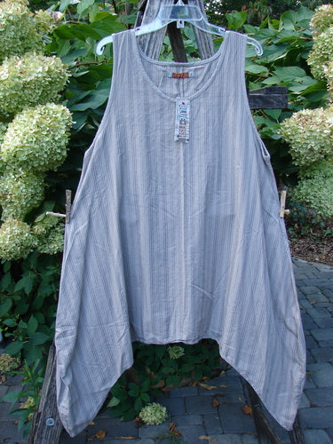 Barclay NWT Percale Hado Shift Stripe Moon Rock Sand Size 1, features a scoop neckline, asymmetrical drapey hem, and vertical pinstripes, displayed on a clear hanger against a natural backdrop.