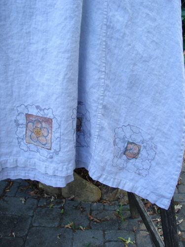 Barclay Linen Pocket Pinafore Mosaic Floral Lavender Size 0 features a scoop neckline, A-line flair, and double exterior pockets with a mosaic floral design, made from lightweight linen.