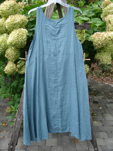 Barclay NWT Linen Tulip Midlayer Overpiece Unpainted La Mer Size 0 hangs elegantly, showcasing a scoop-neck design with a layered crossover front and sweeping A-line flare, embodying Bluefishfinder's creative, vintage aesthetic.