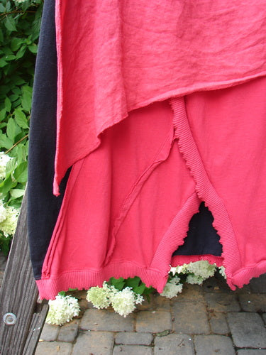 Barclay NWT Mixed Media Swatch Skirt Unpainted Black Rose Size 2 displayed on a pole, showcasing its layered texture and multiple directional swatches with a full elastic waistline.