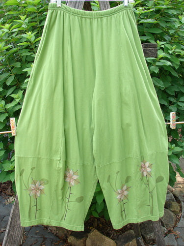 Barclay 4 Square Pant Floral Reach Spearmint Size 0 features a unique 3D diamond drape from the knee down, floral-themed accents, full elastic waistband, and pockets, crafted from mid-weight organic cotton.