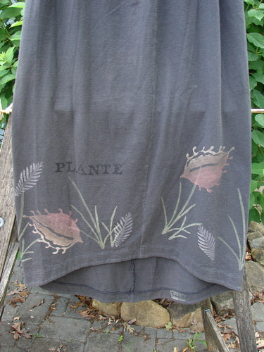 1998 Botanicals Corolla Skirt Plante Vine Raven Size 1 features a botanical vine design on organic cotton fabric with a unique upward scooped hem, elastic waistband, and no pockets.