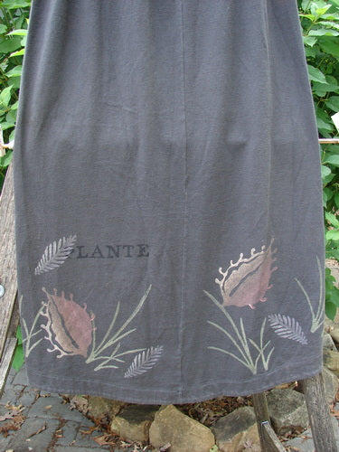 1998 Botanicals Corolla Skirt Plante Vine Raven Size 1 features an upward scooped hemline and full elastic waistband in a plant-inspired pattern, reflecting Bluefishfinder.com's vintage, expressive style.