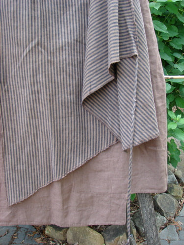 Barclay Linen Every Way Apron Skirt Stripe Mocha Size 0 showcases a medium-weight linen skirt with a full elastic waistline, striped side layer apron, sectional stripe panels, and exterior stitchery.