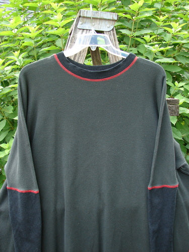 Barclay Thermal Contrast Revival Top Unpainted Black OSFA displayed on a swinger, featuring tapering ribbed sleeves, rounded neckline, and easy side vents, embodying the unique vintage style of Bluefishfinder.com.