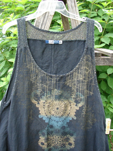 Barclay Linen Lace Two Pocket Pinafore Metallic Travel Black Size 0 features a rounded neckline, deep arm openings, and varying side hem, showcasing intricate lace detailing and metallic travel-themed design.