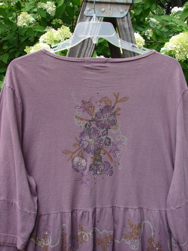 Barclay Peplum Pocket Jacket Magic Garden Dusty Plum Size 2 with floral design, three-quarter sleeves, full ceramic button front, and painted peplum from Bluefishfinder.com's Spring Collection.
